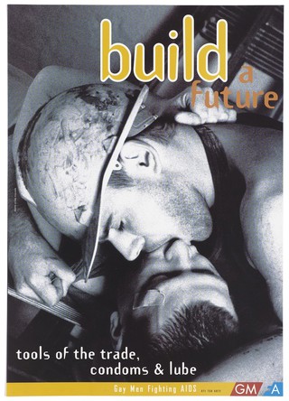 Two men kissing; one wearing a builders safety helmet; advertisement for gay men to use precautions by Gay Men Fighting Aids. Colour lithograph.