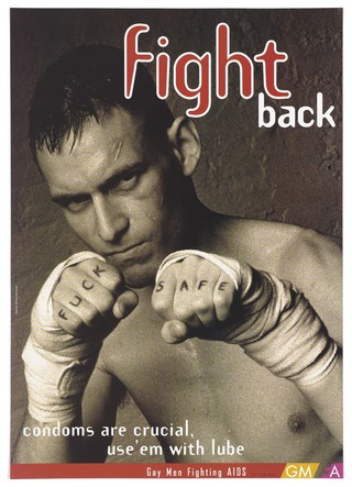 A boxer raises his bandaged fists which bear the letters: 'Fuck safe'; advertisement for gay men to use precautions by Gay Men Fighting Aids. Colour lithograph.