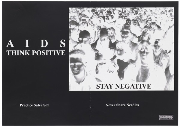 A negative photograph of a crowd of people against a black background; advertisement for safer sex to prevent AIDS/HIV by the Department of Health. Lithograph.