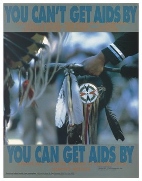 A native American holding a drum stick with feathers and decorative hangings with a list of ways you can and can't get AIDS; advertisement by the American Indian Health Care Assocation. Colour lithograph by Christopher Sheriff, 1989.