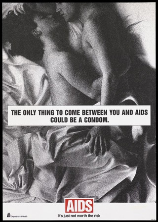 A naked couple lying in bed with a warning to use condoms to prevent AIDS; advertisement by the Department of Health. Colour lithograph.