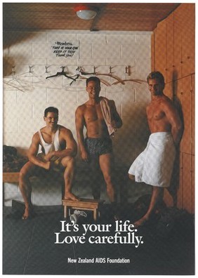 Three men in a state of undress in a changing room with a warning to love carefully; advertisement by the New Zealand AIDS Foundation. Colour lithograph.