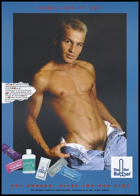 A bare-chested man pulling his jeans open to reveal his groin area with a selection of condoms and lubricant produced by The Hot Rubber Company; includes a torn extract highlighting the word 'hot'. Colour lithograph after Norbert Heuler.