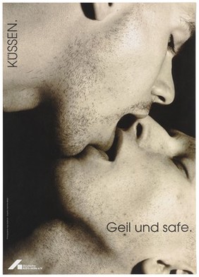 The faces of two men with stubble kiss with open mouths, with the message: "To kiss: sexy and safe"; an advertisement for safe sex by the Deutsche AIDS-Hilfe e.V. Colour lithograph by Ingo Taubhorn and Trash Line Design.