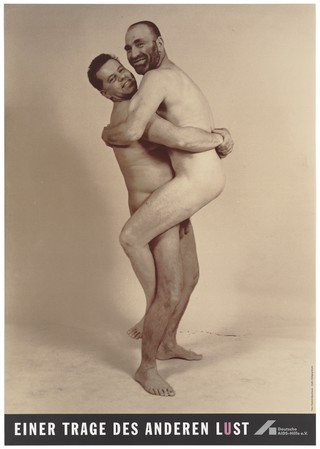 A naked man is held up by another; advertising safe sex. Colour lithograph by Friedrich Baumhauer and Wolfgang Mudra for the Deutsche AIDS-Hilfe e.V.