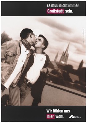Two gay men kiss as they walk beside a river with a church tower beyond; advertising safe sex. Colour lithograph by Michael Taubenheim and Wolfang Mudra for the Deutsche AIDS-Hilfe e.V.