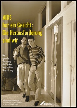 A man in a striped t-shirt with his arm around another man who helps him to walk down a hospital corridor with a wheelchair and drip stand near by; with an appeal for support for the Deutsche AIDS-Hilfe donation account for the special care of the sick. Colour lithograph by Ingo Taubhorn and Wolfgang Mudra.