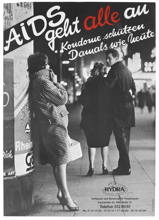 A man walks arm in arm with a woman while looking back at a prostitute in a check coat; representing the need for prostitutes to use condoms to prevent AIDS. Colour lithograph after Ullstein Bilderdienst for Hydra, 199-.
