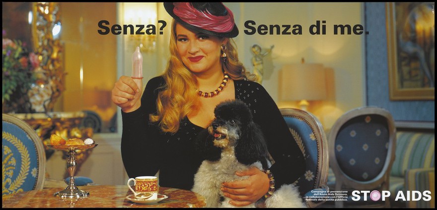 A woman wearing a feathered hat and holding a poodle on her lap at a table holds up a thumb on which is a blown-up condom; with the message: 'Without? Without me'; Italian version of a series of safe sex posters from a 'Stop AIDS' poster campaign by the Federal Office of Public Health, in collaboration with the Aiuto AIDS Svizzero. Colour lithograph.