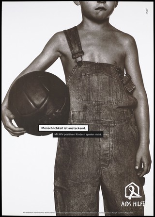 A forlorn-looking boy wearing dungarees stands with a ball under one arm and with one brace undone; with the message in German 'Humanity is contagious. With HIV (positive) children do not play'; an advertisement by the AIDS-Hilfe. Colour lithograph by PK&P.