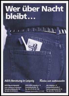 The rear jeans pocket of a man with a packet labelled "The hot rubber" and a toothbrush with the message 'who stays overnight ...' in German; an advertisement for AIDS counselling services available in Leipzig and Hot Rubber condoms for gay men. Colour lithograph.