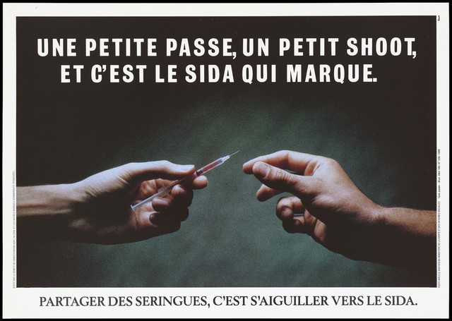 A hand offers a syringe to another hand with a warning about transmission of AIDS through needle-sharing. Colour lithograph, 1988, for the Coordination Committee on Alcohol and Other Drugs (French Community in Belgium).
