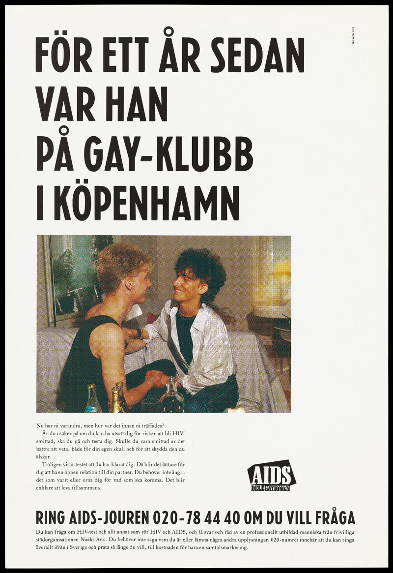 Two young gay men sit holding hands on a sofa before numerous bottles of  drink with a block of text about the importance of safe sex below in  Swedish. Colour lithograph by