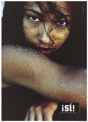 The face and glittered arm of a dark-haired woman up close; Spanish version in a series of AIDS prevention advertisements entitled 'Yes' by Folkhälsoinstitutet. Colour lithograph by Nina Vestlund & Co and Anti Wendel, ca. 1995.