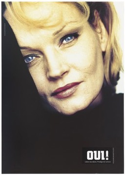 The face of a middle-aged blonde-haired woman wearing black; French version in a series of AIDS prevention advertisements entitled 'Yes' by Folkhälsoinstitutet. Colour lithograph by Nina Vestlund & Co and Anti Wendel, ca. 1995.
