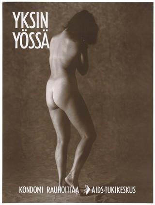 The back view of a standing naked woman with the message 'Alone overnight. Condoms reassure'; a safe sex and AIDS prevention advertisement for the AIDS-Tukikeskus, the AIDS support centre by the Finnish AIDS Council. Colour lithograph, ca. 1995.