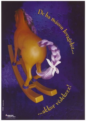 The back of an orange hobbyhorse with purple hair tied with a bow on its tail representing an advertisement for Ôvegylet alapítvány, a Foundation to promote safer sex and AIDS in Hungary. Colour lithograph by Sebastian Hänel for DMB&B.