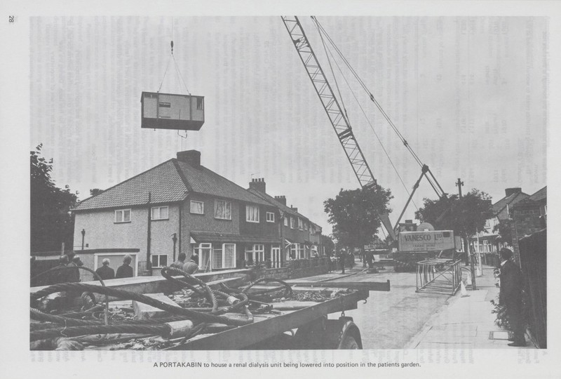 28 A PORTAKABIN to house a renal dialysis unit being lowered into position in the patients garden.