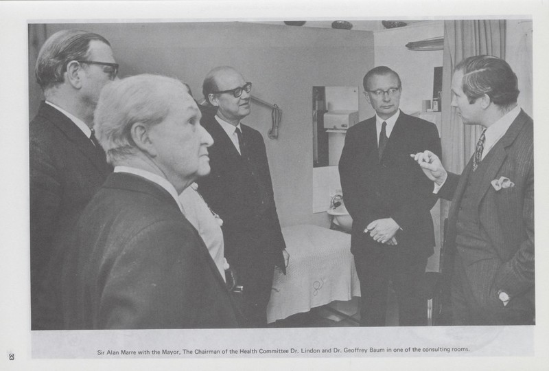 33 Sir Alan Marre with the Mayor, The Chairman of the Health Committee Dr. Lindon and Dr. Geoffrey Baum in one of the consulting rooms.