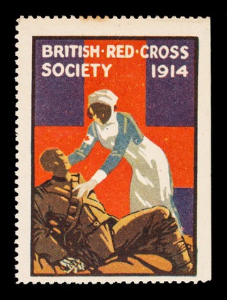 British Red Cross Society 1914 : [nurse bending over soldier lying on the ground].
