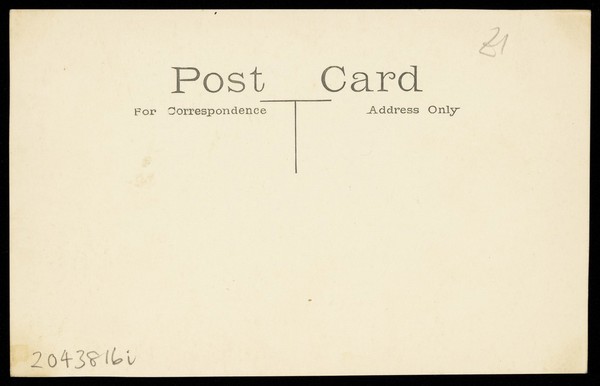 Two amateur actors, both in drag, confront each other on stage. Photographic postcard, ca. 1918.