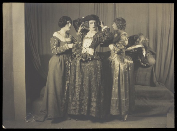 Cecil Beaton in theatrical drag, with others. Photograph by Hill & Saunders , ca. 1925.