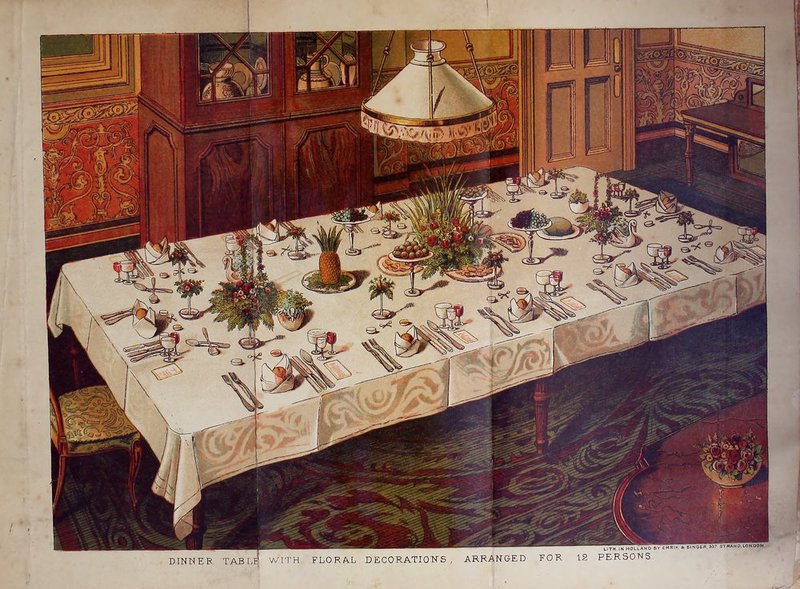 DINNER TAB WITH FLORAL DECORATIONS, ARRANGED FOR 12 PERSONS