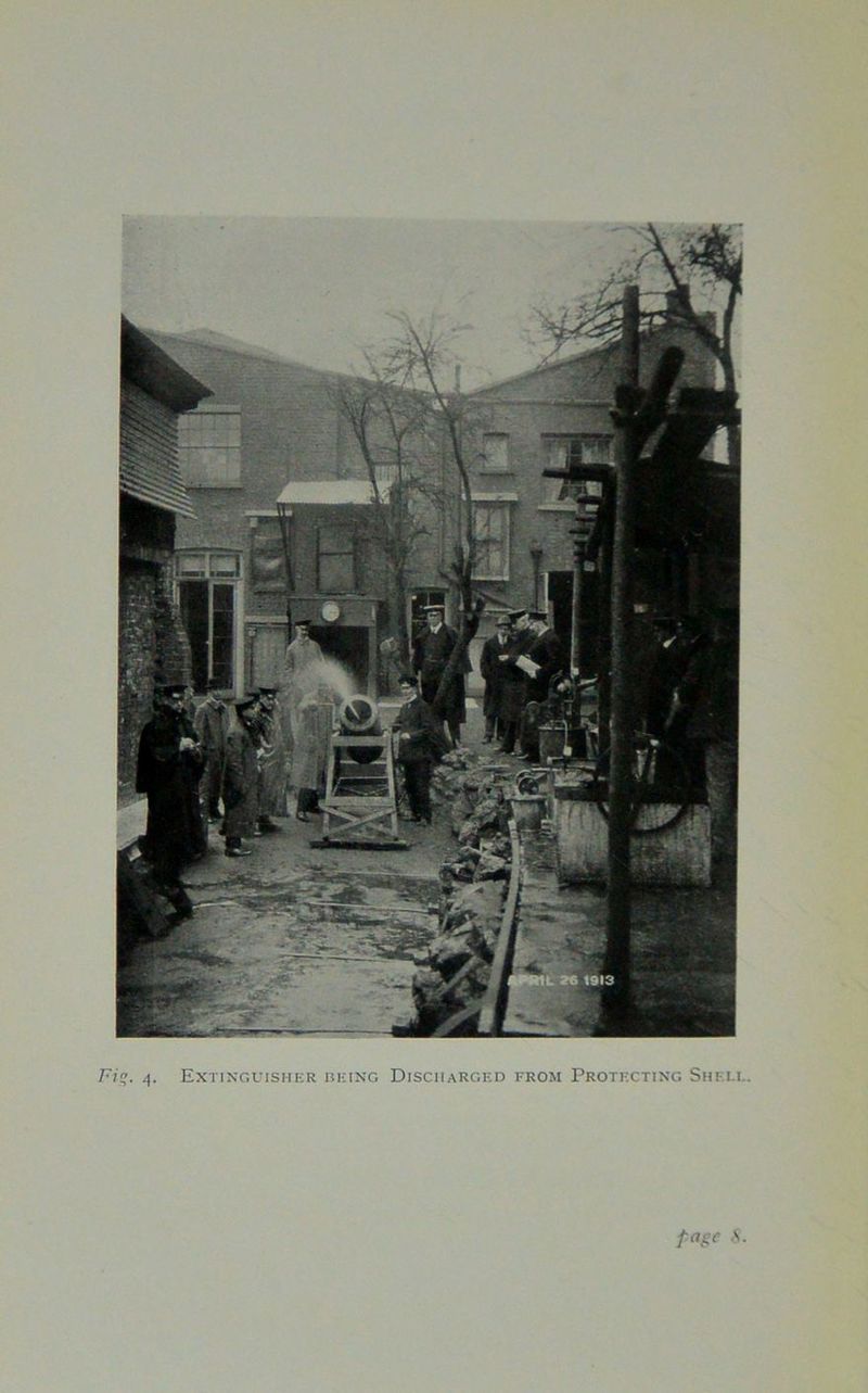Fiq. 4. Extinguisher being Discharged from Protecting Shell. fagc S