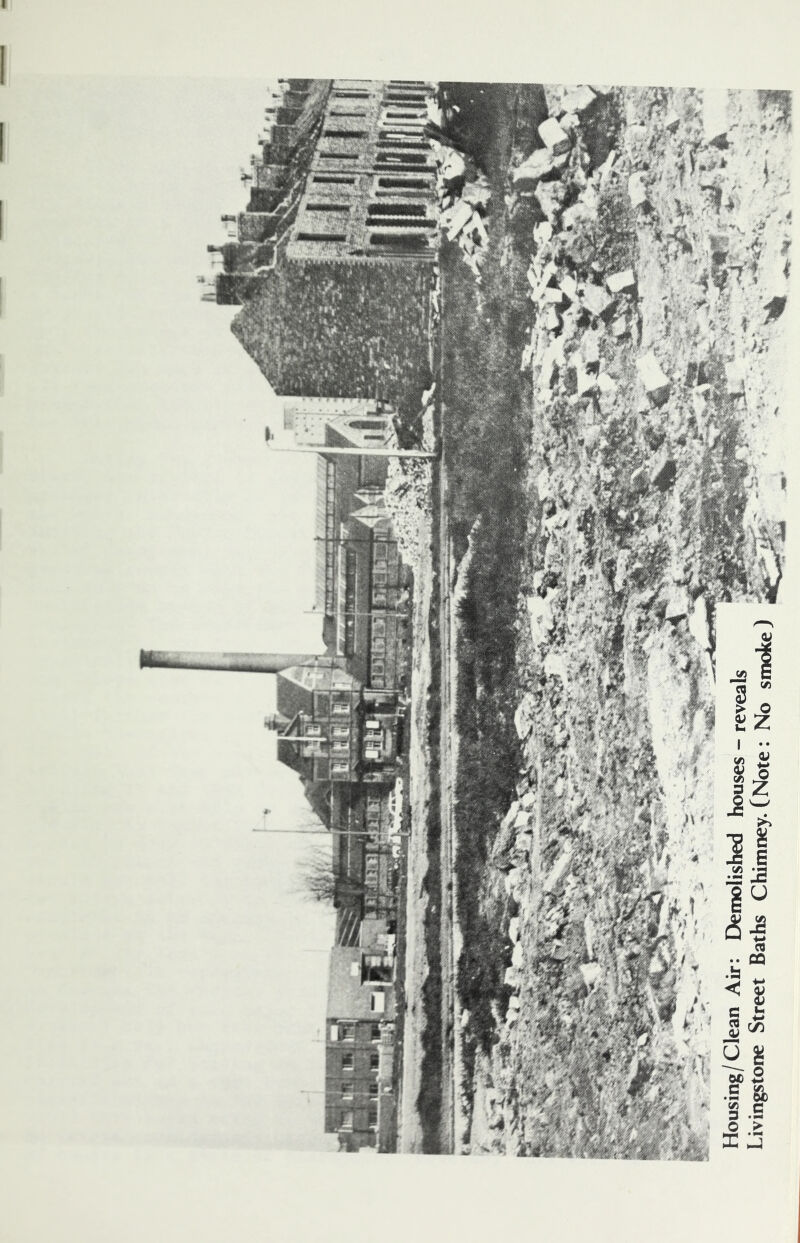 Housing/Clean Air: Demolished houses - reveals Livingstone Street Baths Chimney. (Note: No smoke)