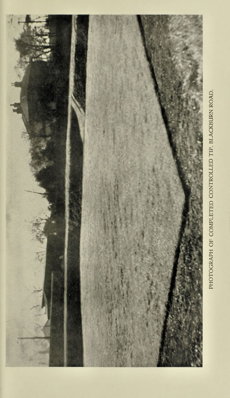 PHOTOGRAPH OF COMPLETED CONTROLLED TIP, BLACKBURN ROAD.