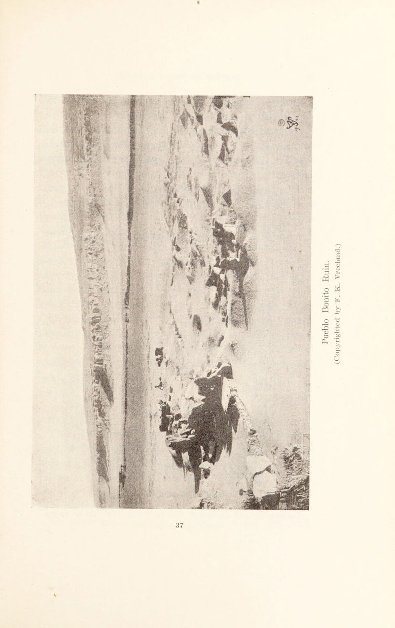 * v Pueblo Bonito Ruin. (Copyrighted by P. K. Yreeland.)