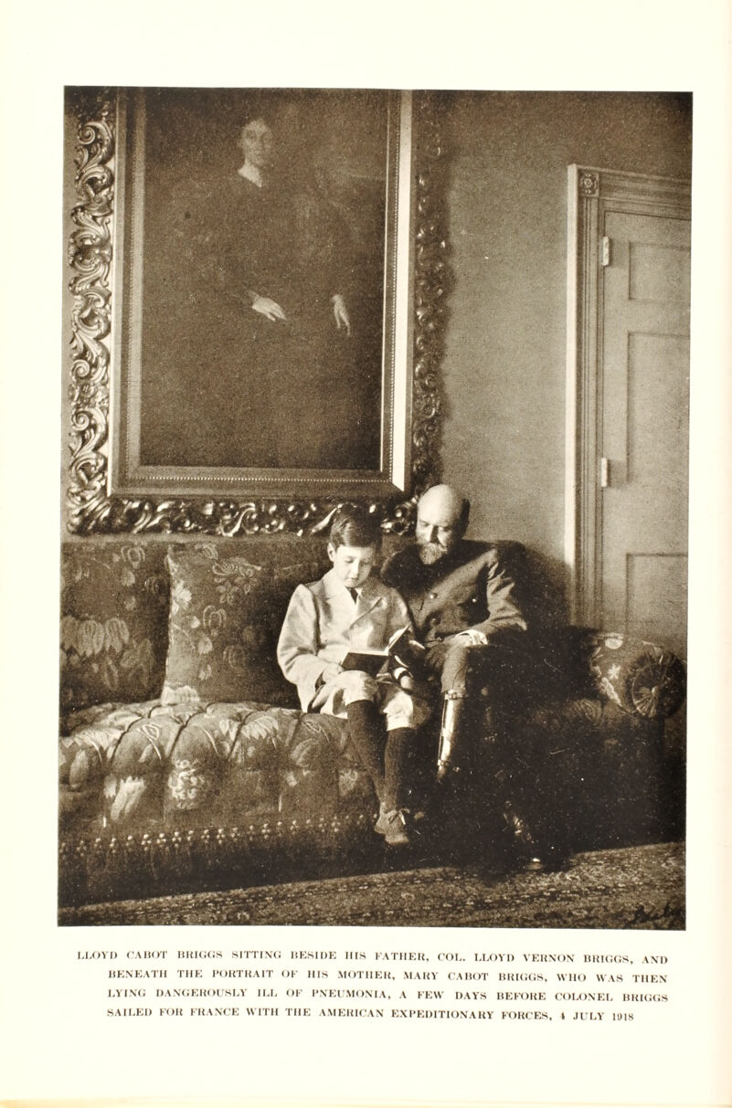 LLOYD CABOT BIUGC.S SITTING BESIDE HIS FATHER, COL. LLOYD VERNON BRIGGS, AND BENEATH THE PORTRAIT OF Ills MOTHER. MARY CABOT BRIGGS, WHO WAS THEN LYING DANGEROUSLY ILL OF PNEUMONIA, A FEW DAYS BEFORE COLONEL BRIGGS SAILED FOR FRANCE WITH THE AMERICAN EXPEDITIONARY FORCES, I JULY 1018