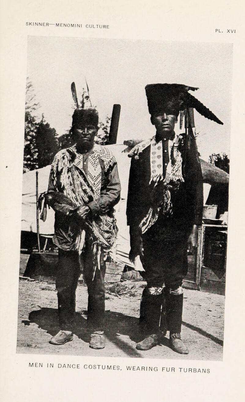PL. XVI men in dance costumes, wearing fur turbanj