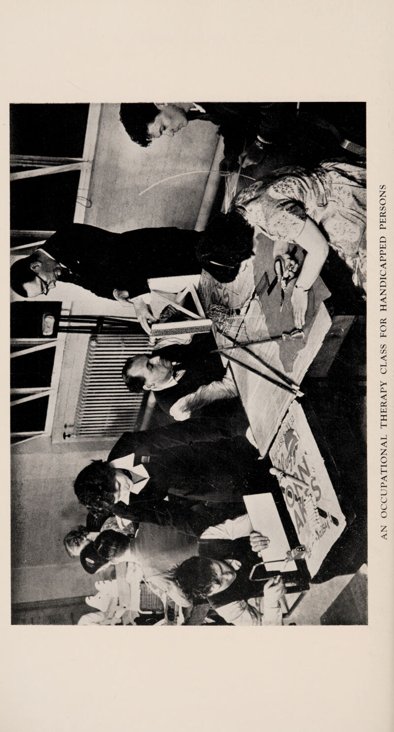 AN OCCUPATIONAL THERAPY CLASS FOR HANDICAPPED PERSONS