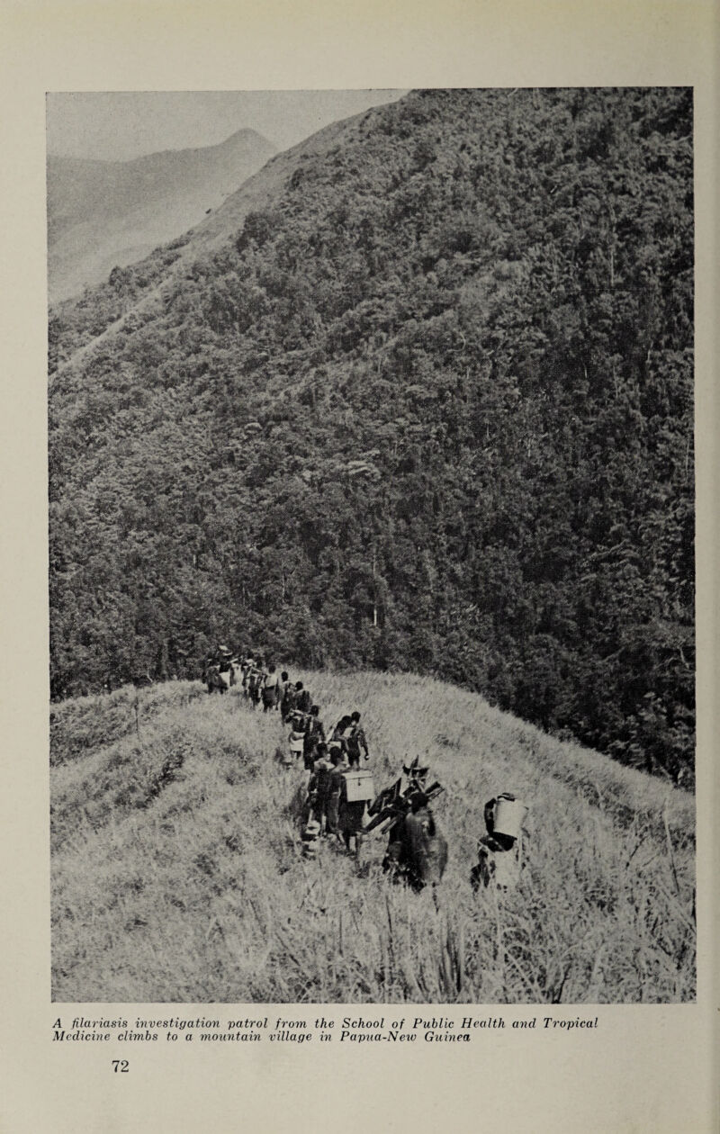 A filariasis investigation patrol from the School of Public Health and Tropical Medicine climbs to a mountain village in Papua-New Guinea