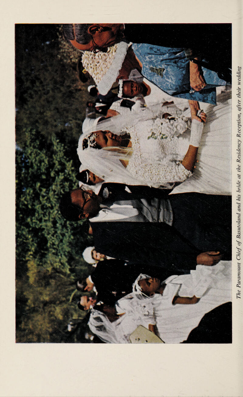 The Paramount Chief of Basutoland and his bride at the Residency Reception, after their wedding