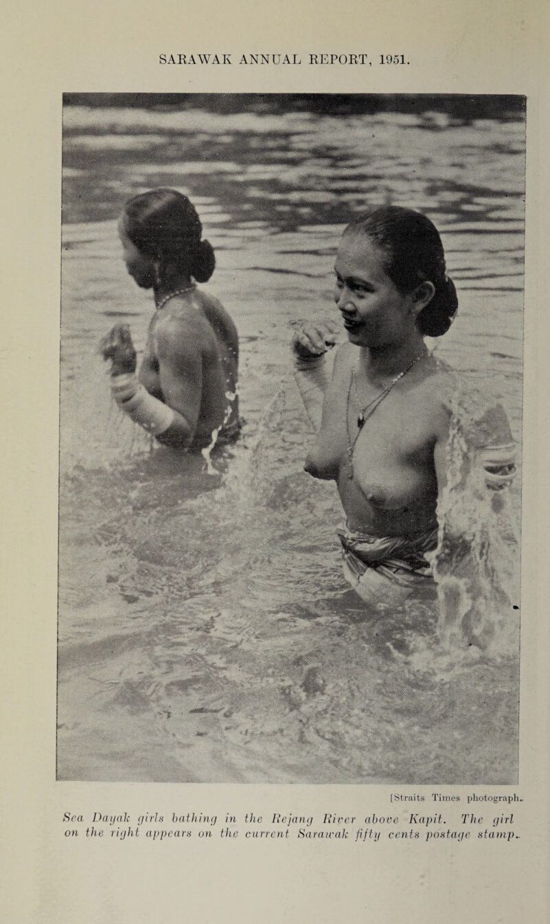 [Straits Times photograph*. Sea Da-yak girls bathing in the Rejang River above Kapit. The girl on the right appears on the current Sarawak fifty cents postage stamp..