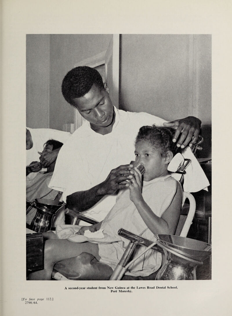 A second-year student from New Guinea at the I.awes Road Dental School, Port Moresby. [To face page 2798/64. 112.]