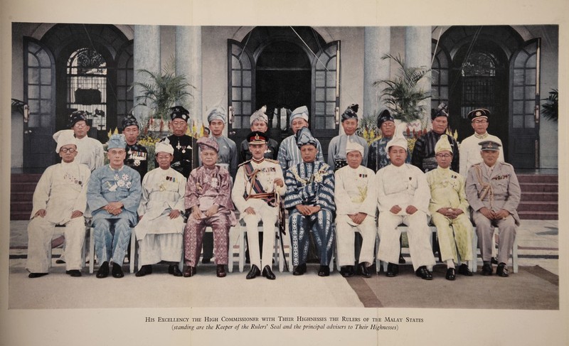 His Excellency the High Commissioner with Their Highnesses the Rulers of the Malay States (.standing are the Keeper of the Rulers' Seal and the principal advisers to Their Highnesses)