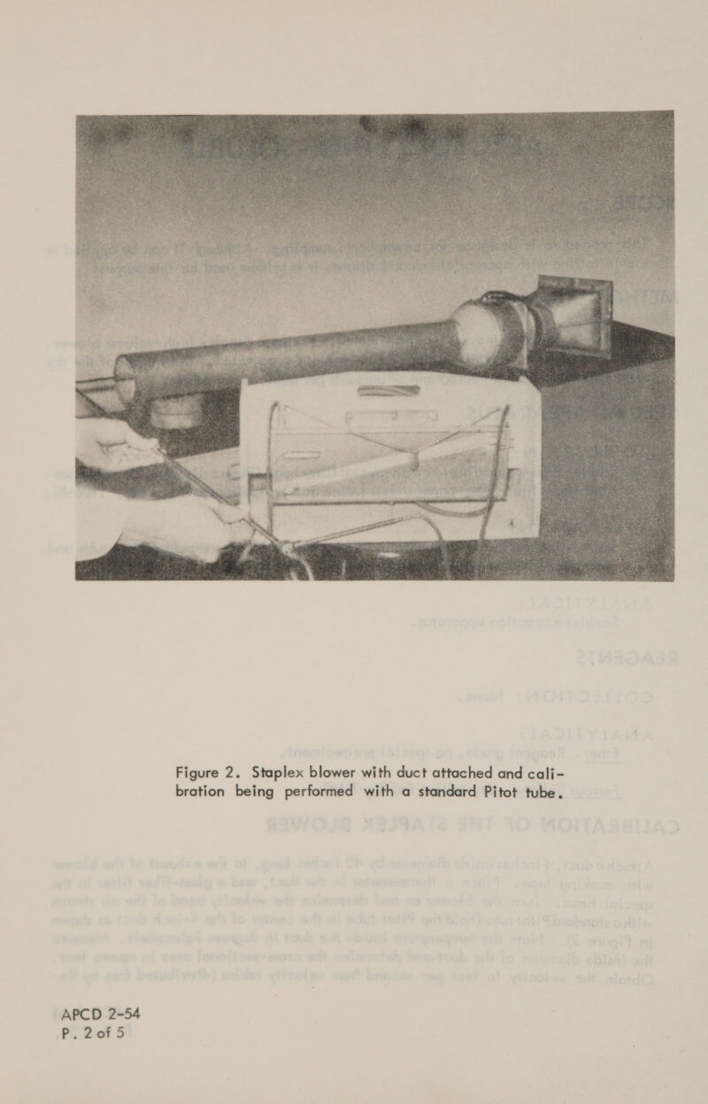 sescemann wpatnsbags  Figure 2. Staplex blower with duct attached and cali- bration being performed with a standard Pitot tube. APCD 2-54