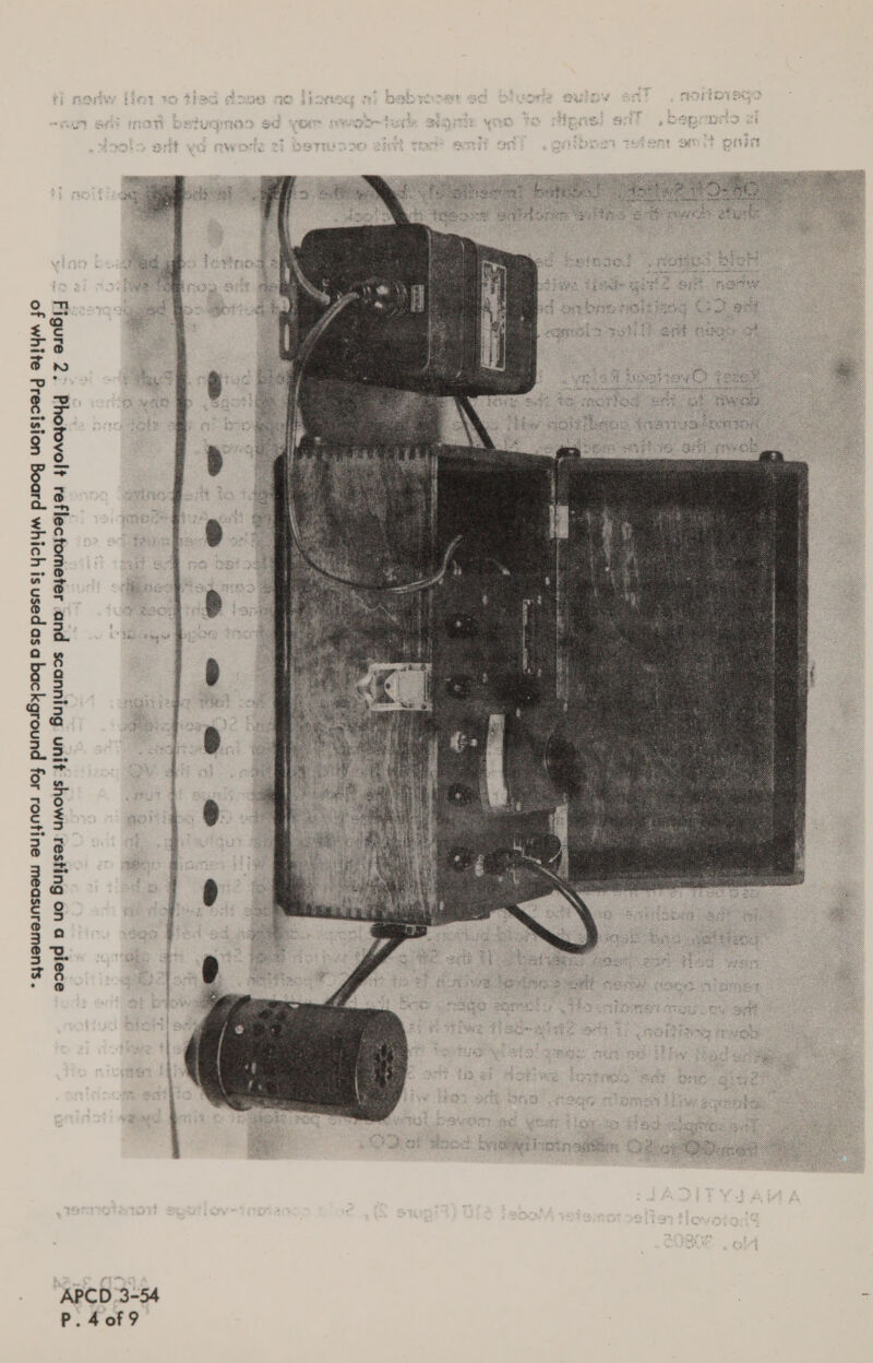  Figure 2. Photovolt reflectometer and scanning unit shown resting on a piece of white Precision Board which is usedasa background for routine measurements. APCD 3-54