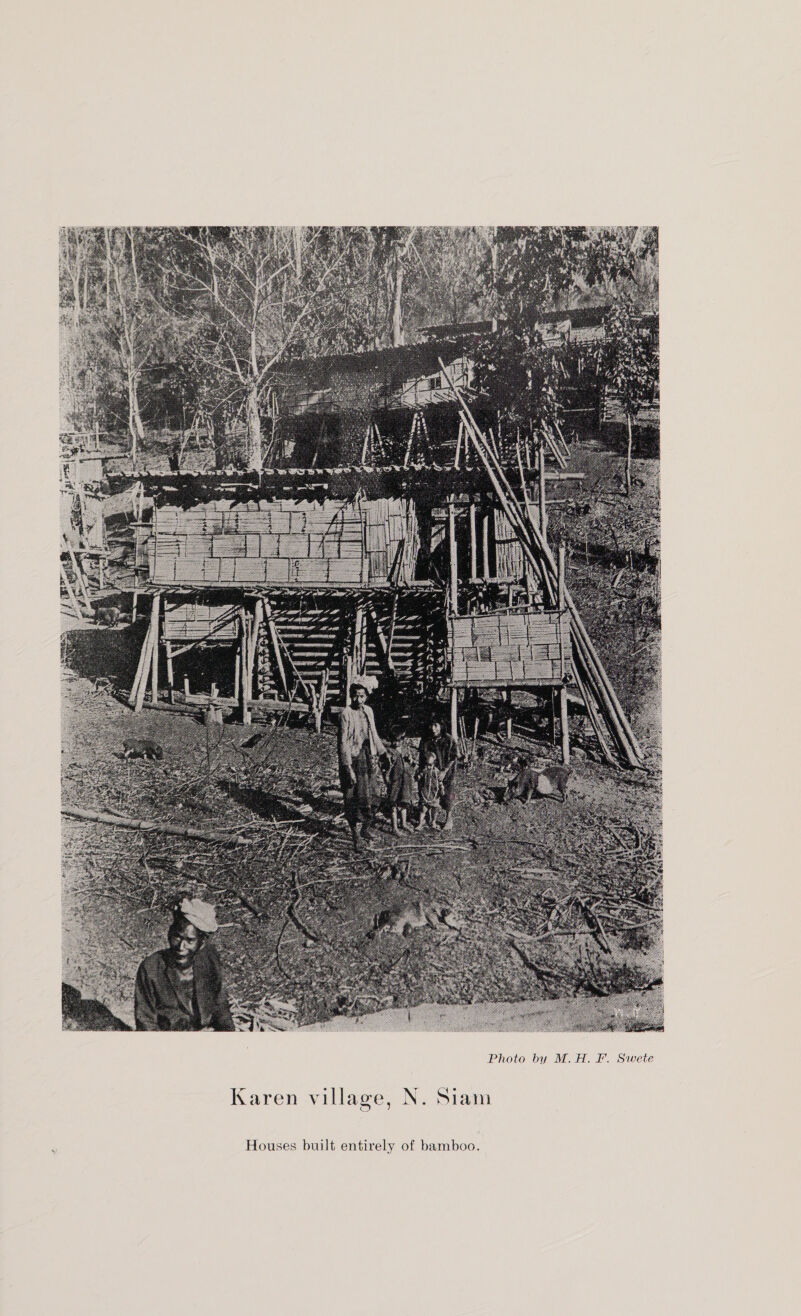  Photo by M. H. I’. Swete  Karen village, N. Siam Houses built entirely of bamboo.