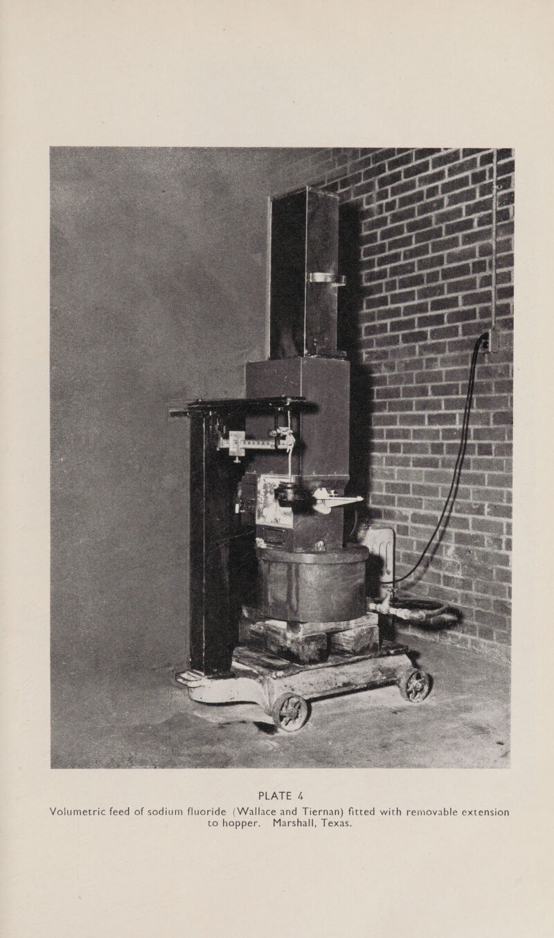  PLATE 4 e extension ted with removabl Volumetric feed of sodium fluoride (Wallace and Tiernan) fit Marshall, Texas. to hopper.