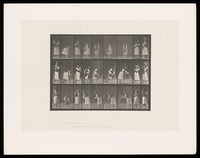 view A clothed woman lifts a water jar and pours from it. Collotype after Eadweard Muybridge, 1887.