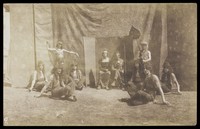 view British servicemen in drag playing characters in a play. Photograph, ca. 1918.