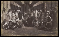 view British servicemen performing a sketch on the power of the press. Photograph, 191-.