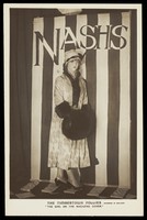 view A soldier in drag modelling for "The Timbertown Follies" at a prisoner of war camp in Groningen. Photographic postcard, 191-.