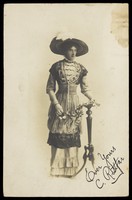 view C. Rittfar wearing Edwardian style dress.