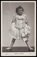 view Edward Garratt in character as "The little stranger". Photographic postcard, ca. 1906.