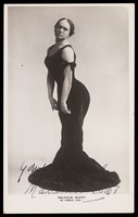view Malcolm Scott in character as a "Gibson Girl". Photographic postcard, 191-.